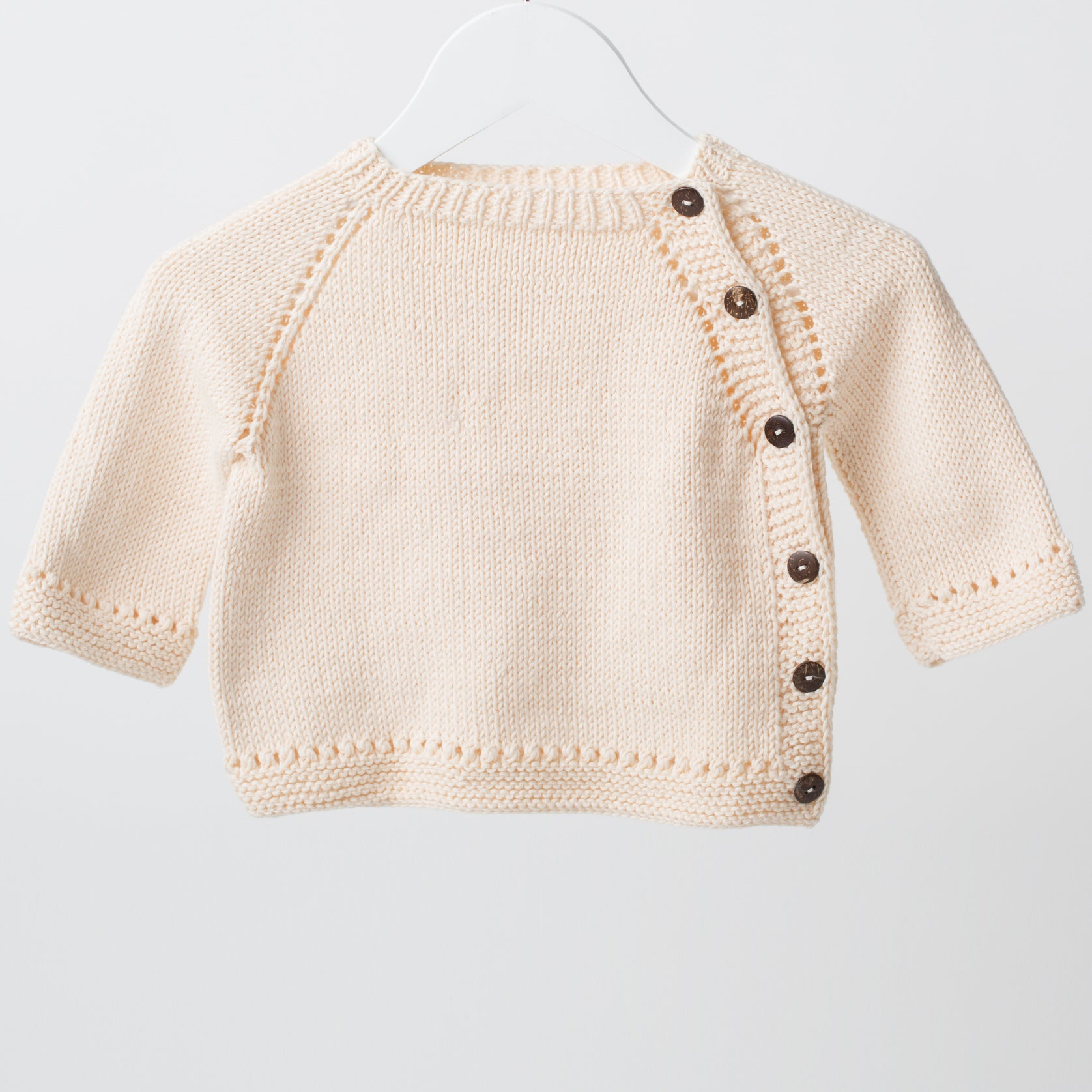 Elegant Natural Side-Buttoned Knitted Baby Cardigan